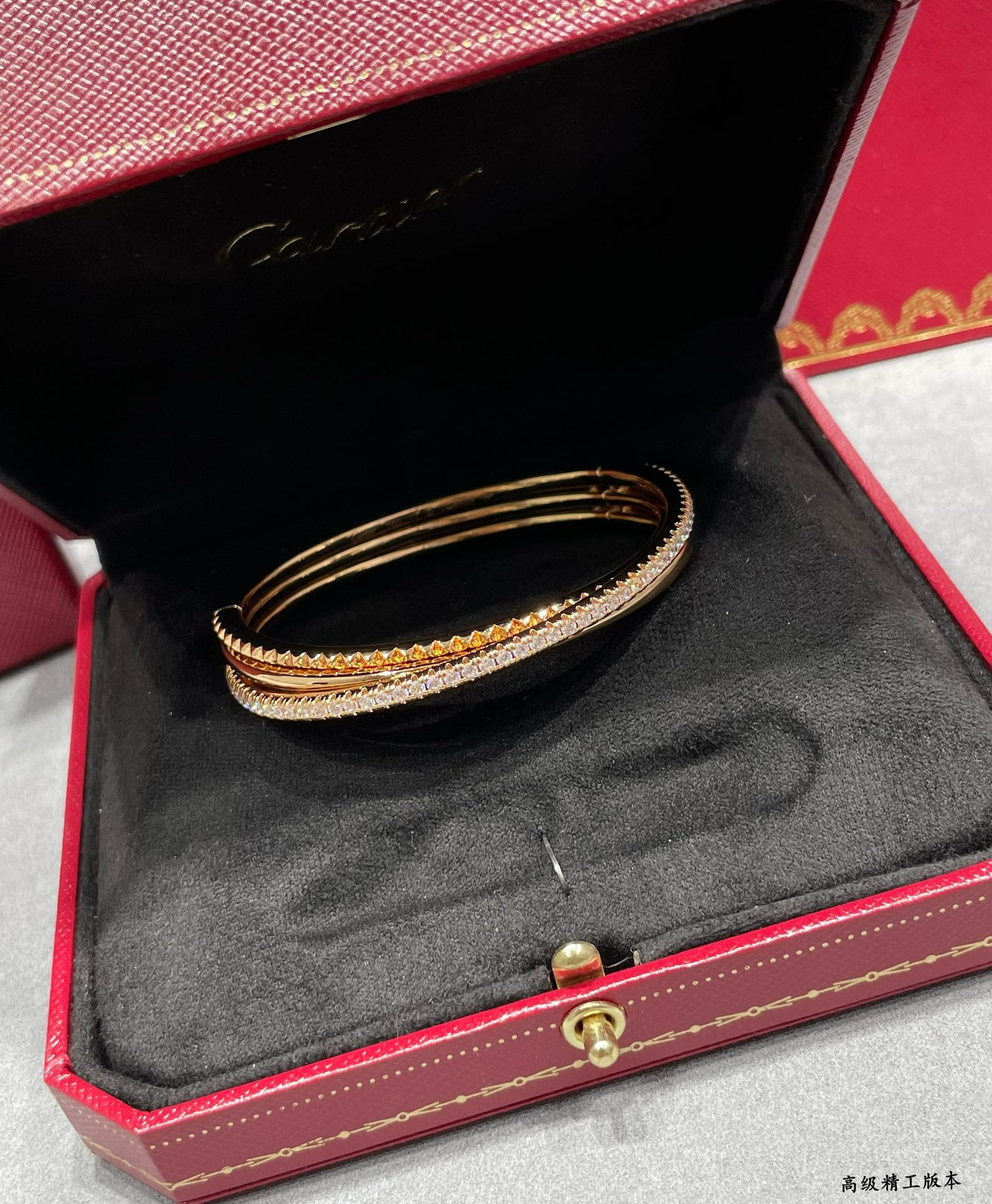 Ca*t*er three-ring rivet bracelet
