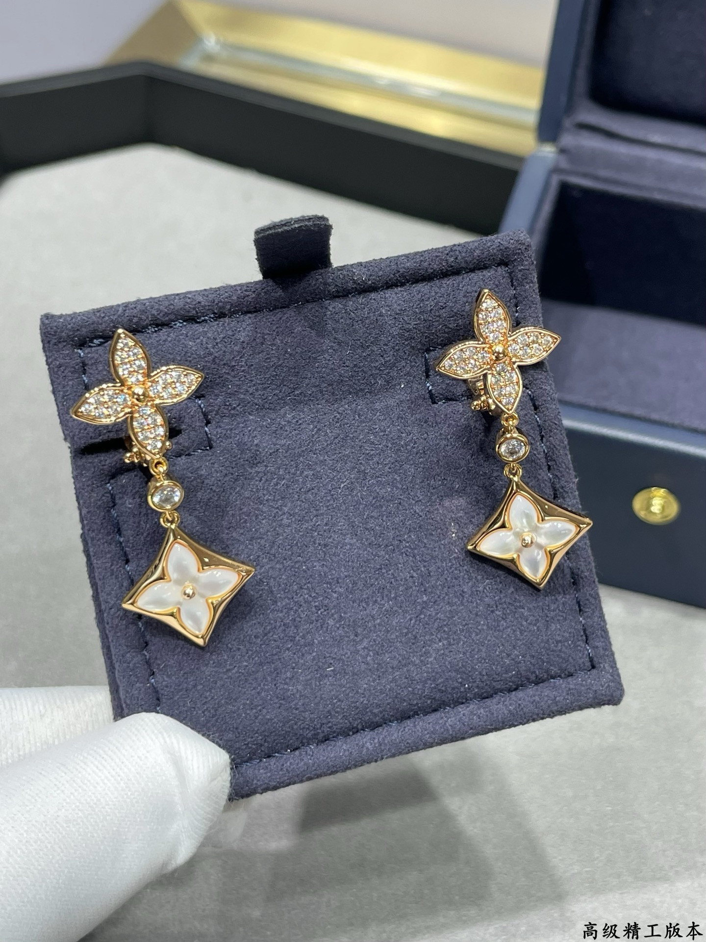 lv two flower Di*m*nd white shell earrings
