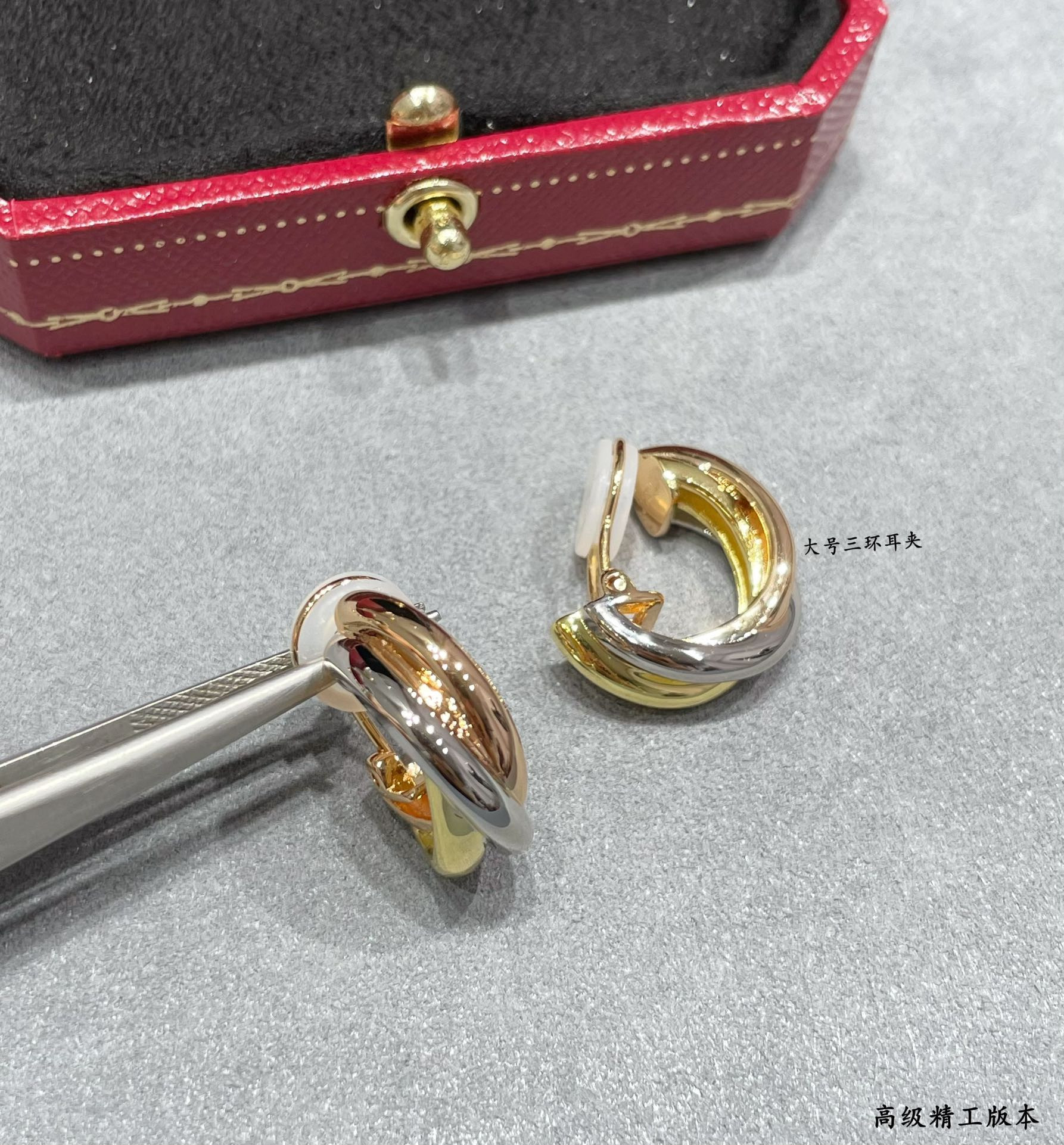 Ca*t*er large three-hand earrings