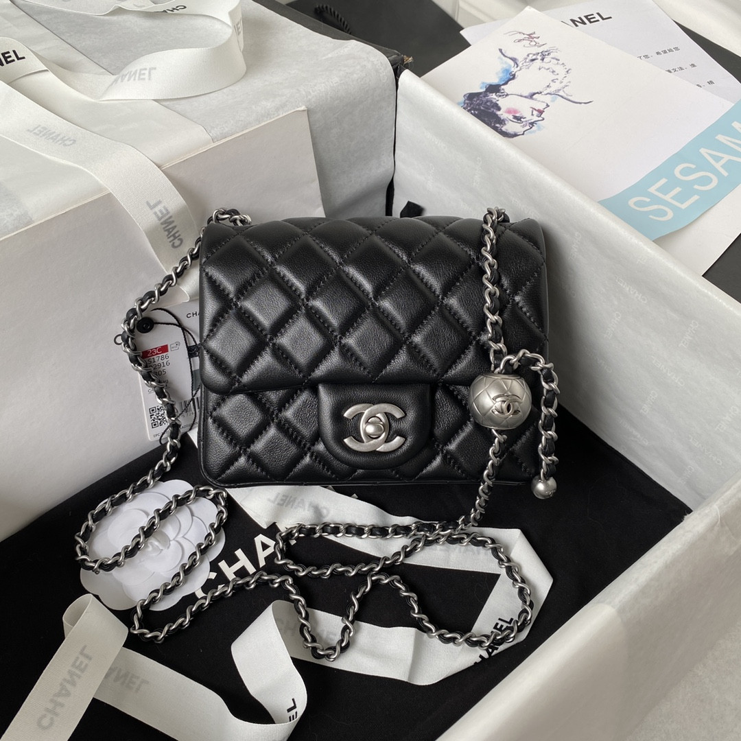 Ch*el mini flap bag shiny calfskin & silver-tone metal black 5.3 × 6.6 × 3.1 in