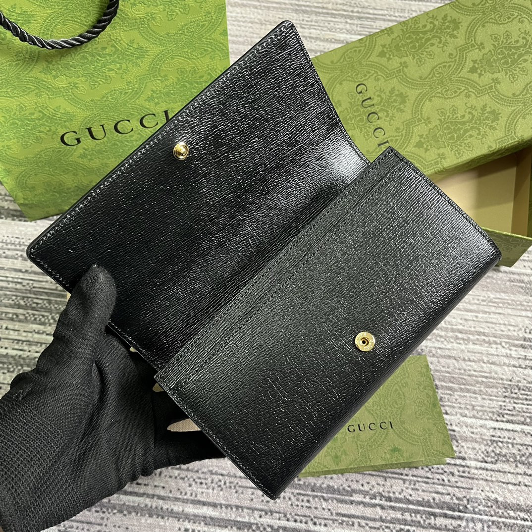 continental wallet with G*u*i script  7.5"w x 4"h x 1.4"d
