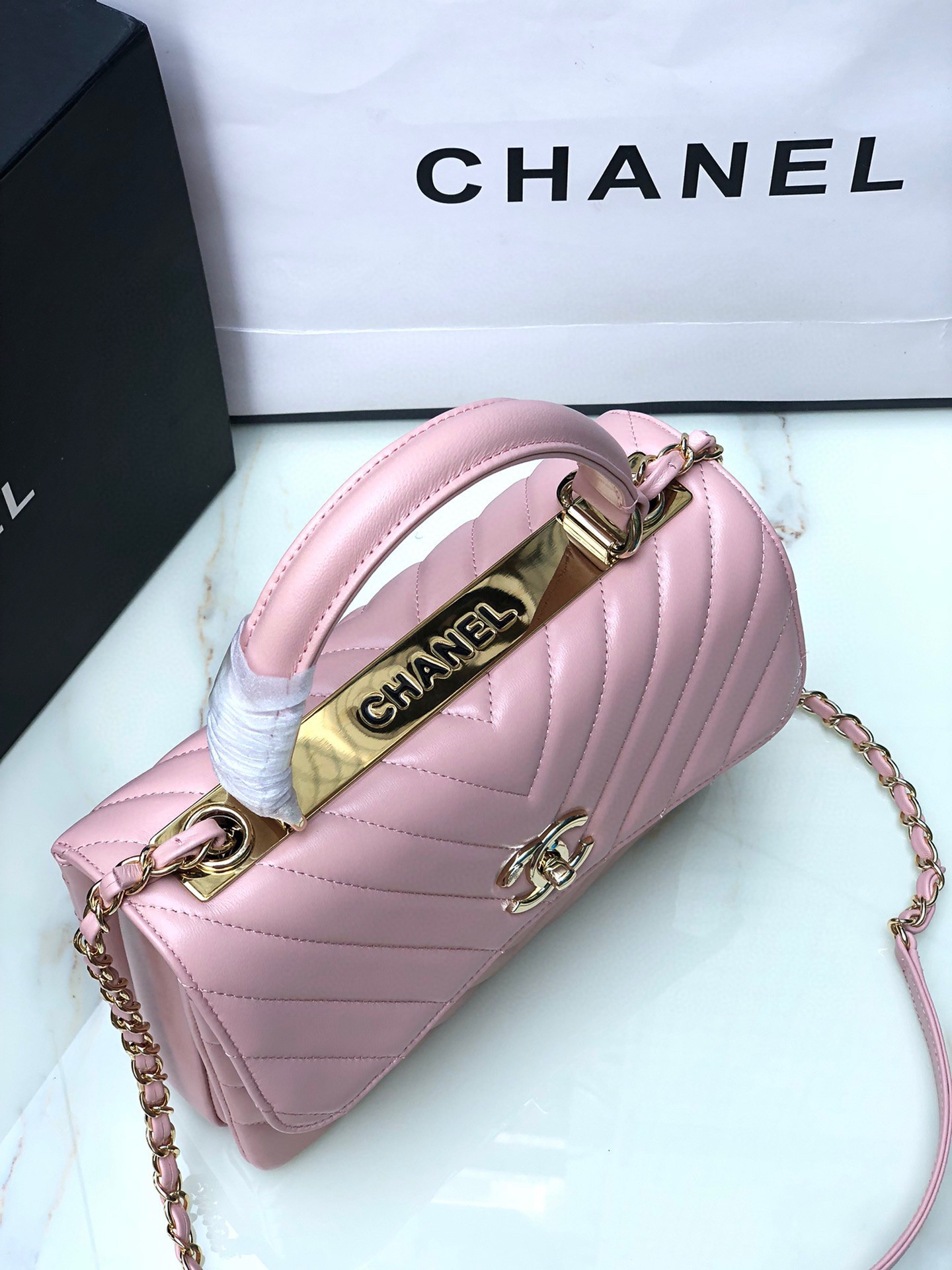 Ch*el flap bag with top handle pink 6.6 × 9.8 × 4.7 in