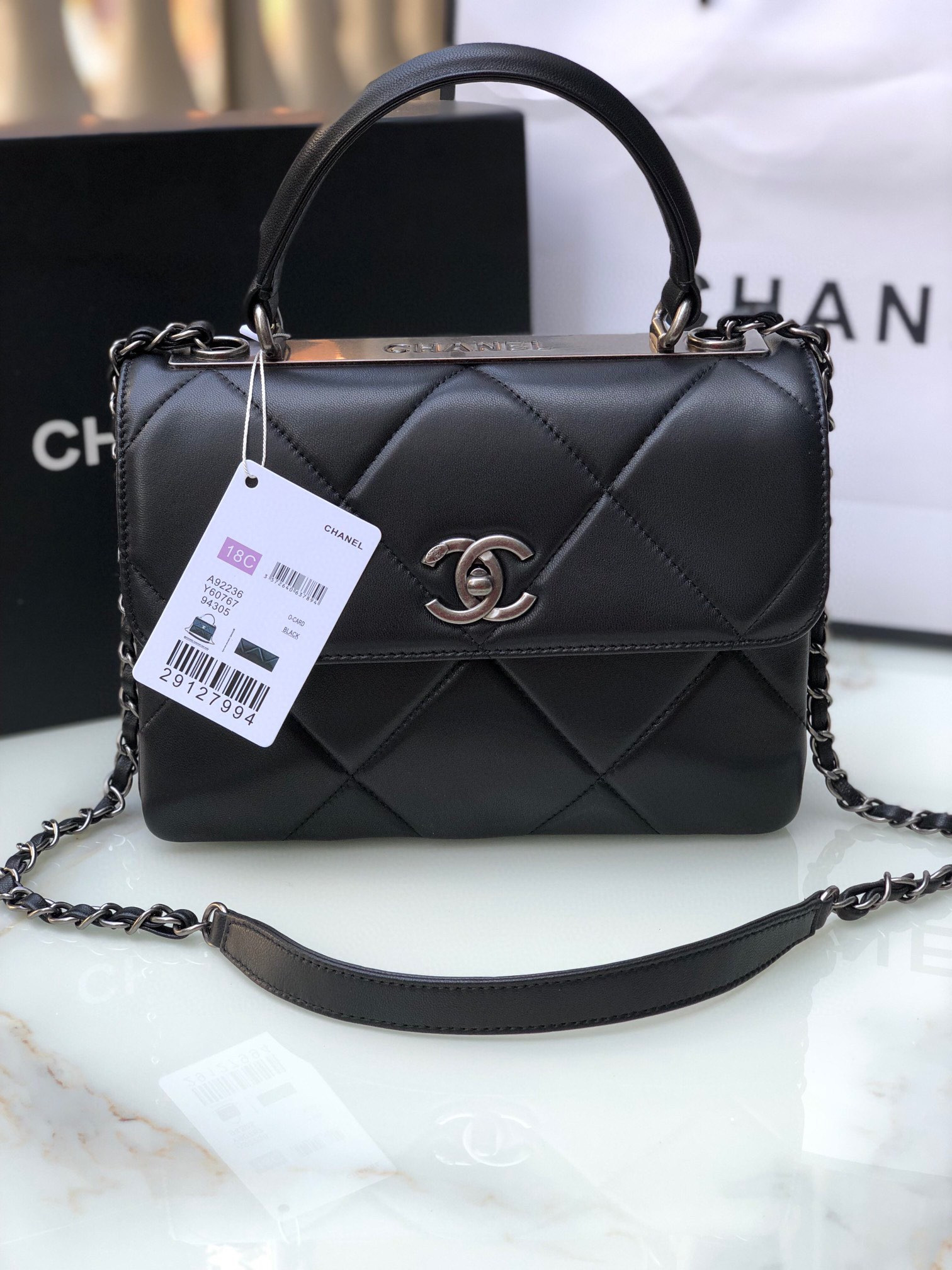 Ch*el flap bag with top handle 6.6 × 9.8 × 4.7 in