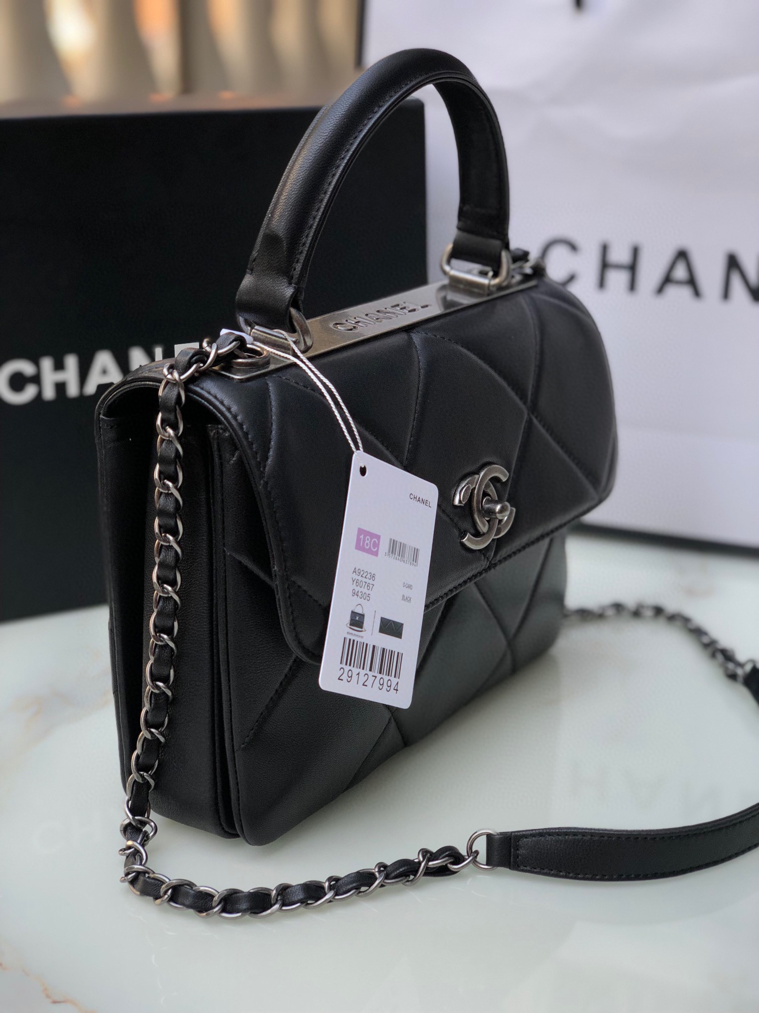 Ch*el flap bag with top handle 6.6 × 9.8 × 4.7 in