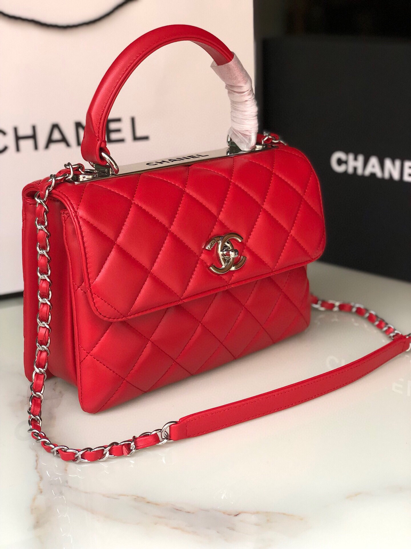 Ch*el flap bag with top handle 6.6 × 9.8 × 4.7 in