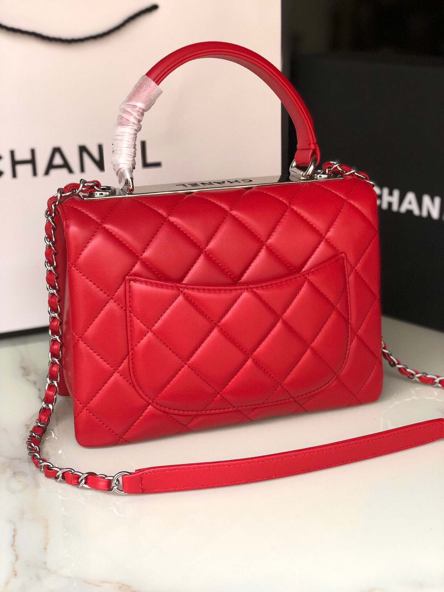 Ch*el flap bag with top handle 6.6 × 9.8 × 4.7 in