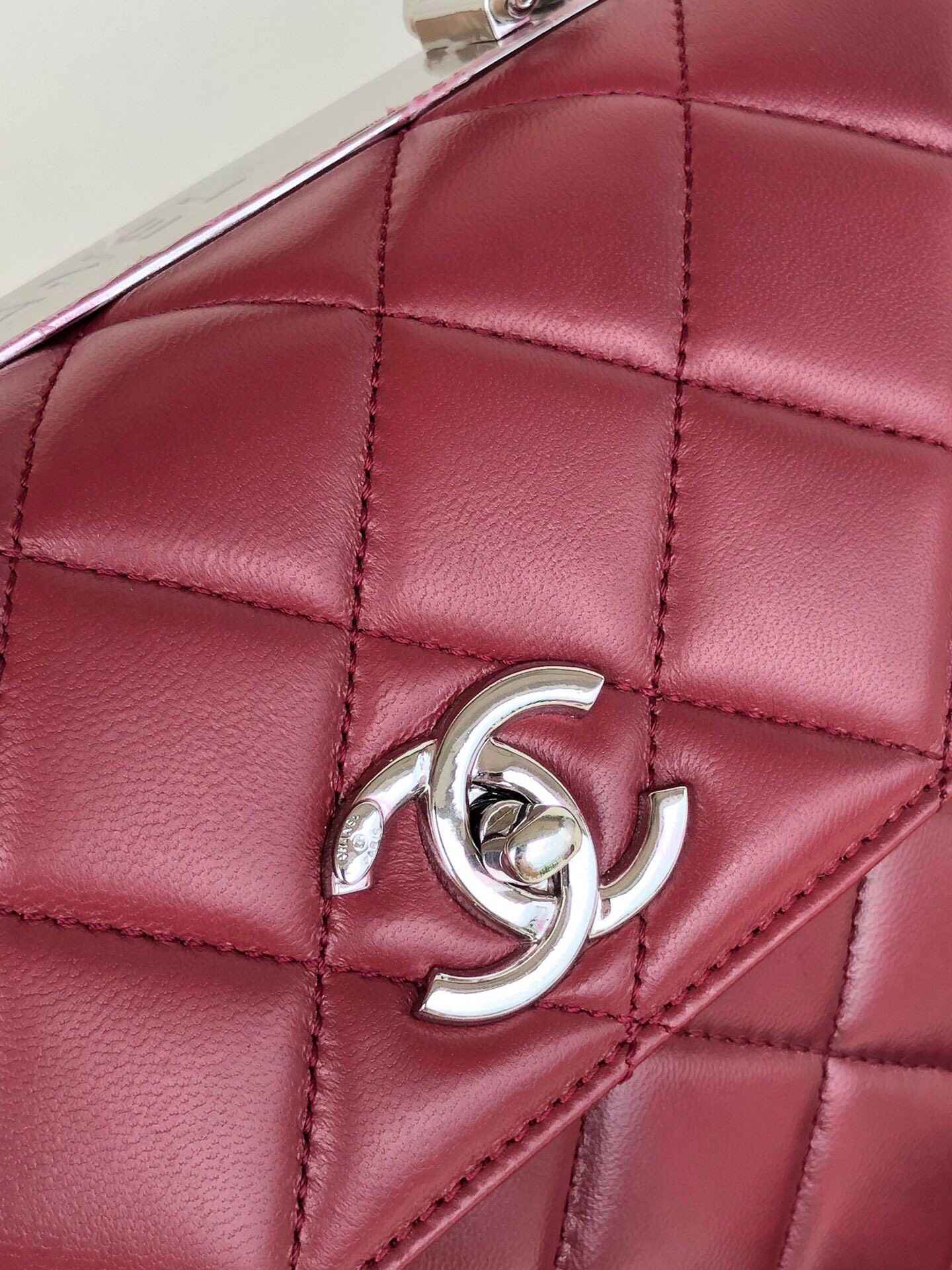 Ch*el flap bag with top handle 6.6 × 9.8 × 4.7 in
