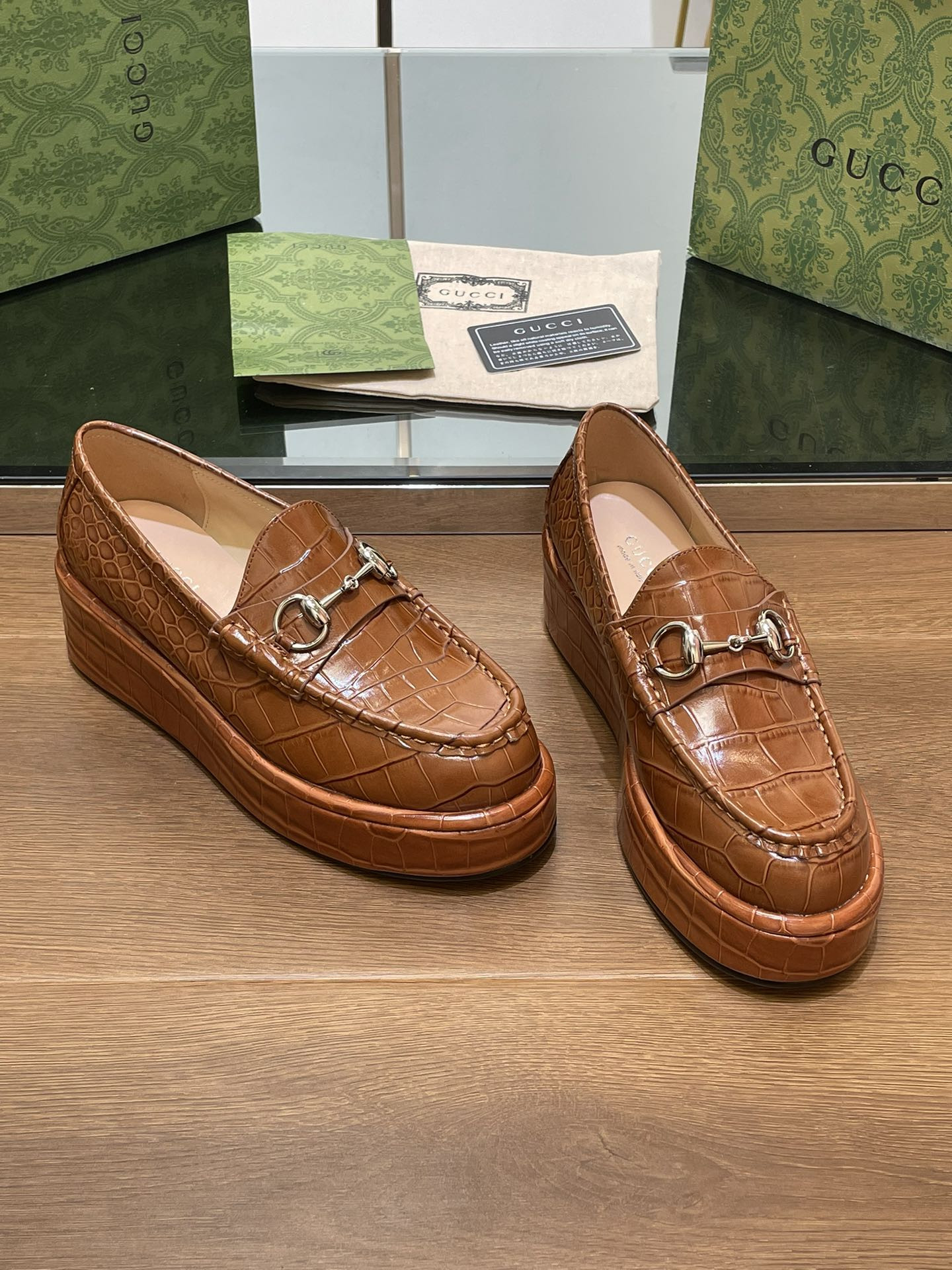ua G*u*i horsebit wedge loafer