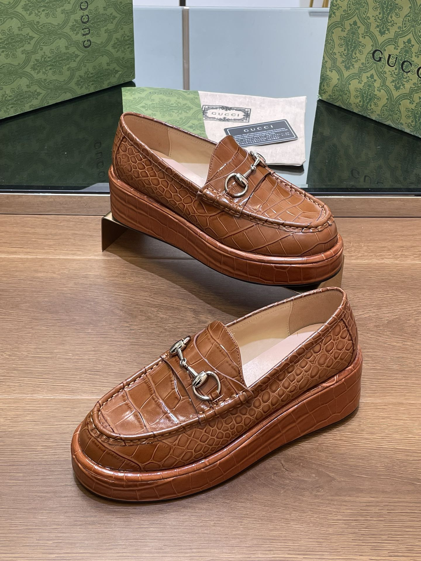 ua G*u*i horsebit wedge loafer