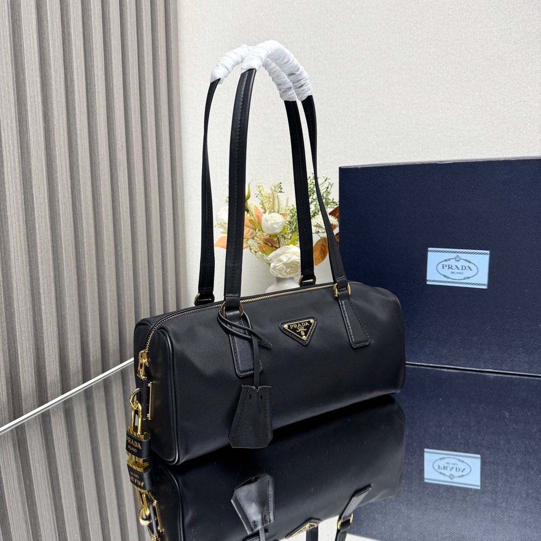 Pra*a re-nylon and leather medium top-handle bag with padlock 12.5x29x10cm