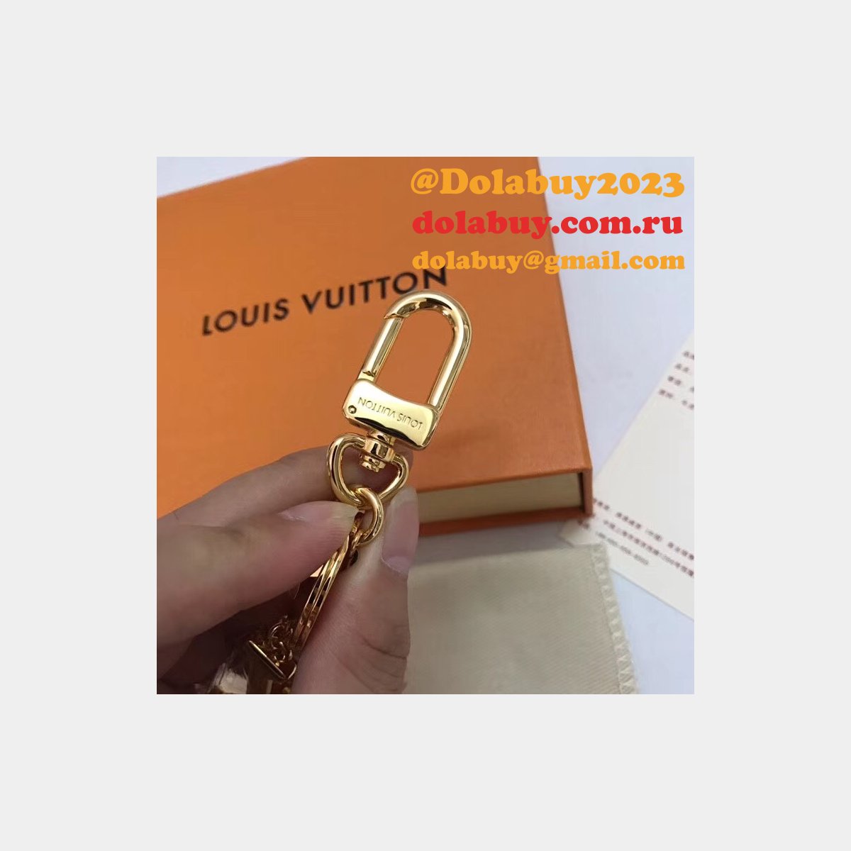 Fake LV Wholesale Facettes Bags Charm & Key Holder M65216 Gold
