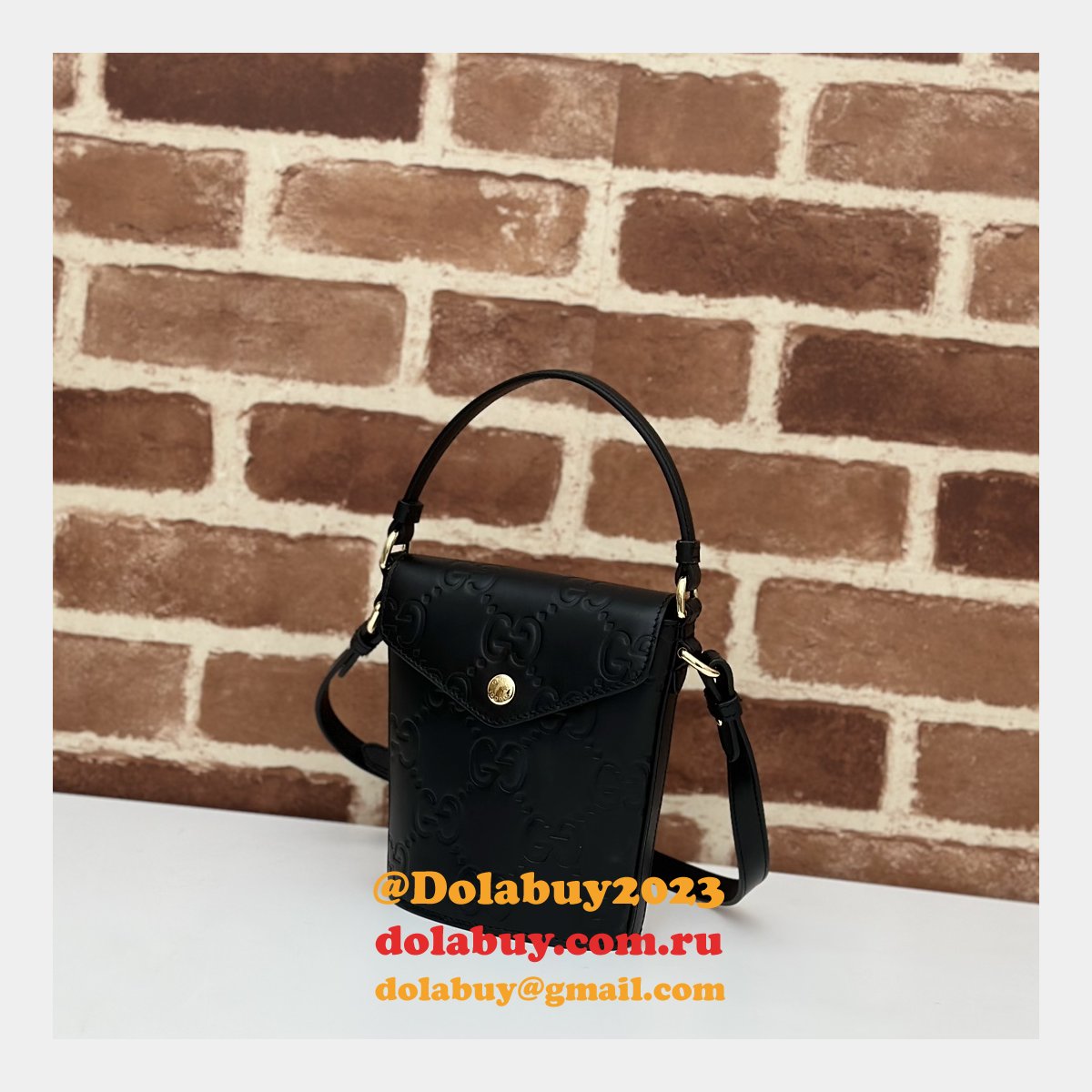 G*u*i 772795 uk embossed top handle replicas shoulder bag