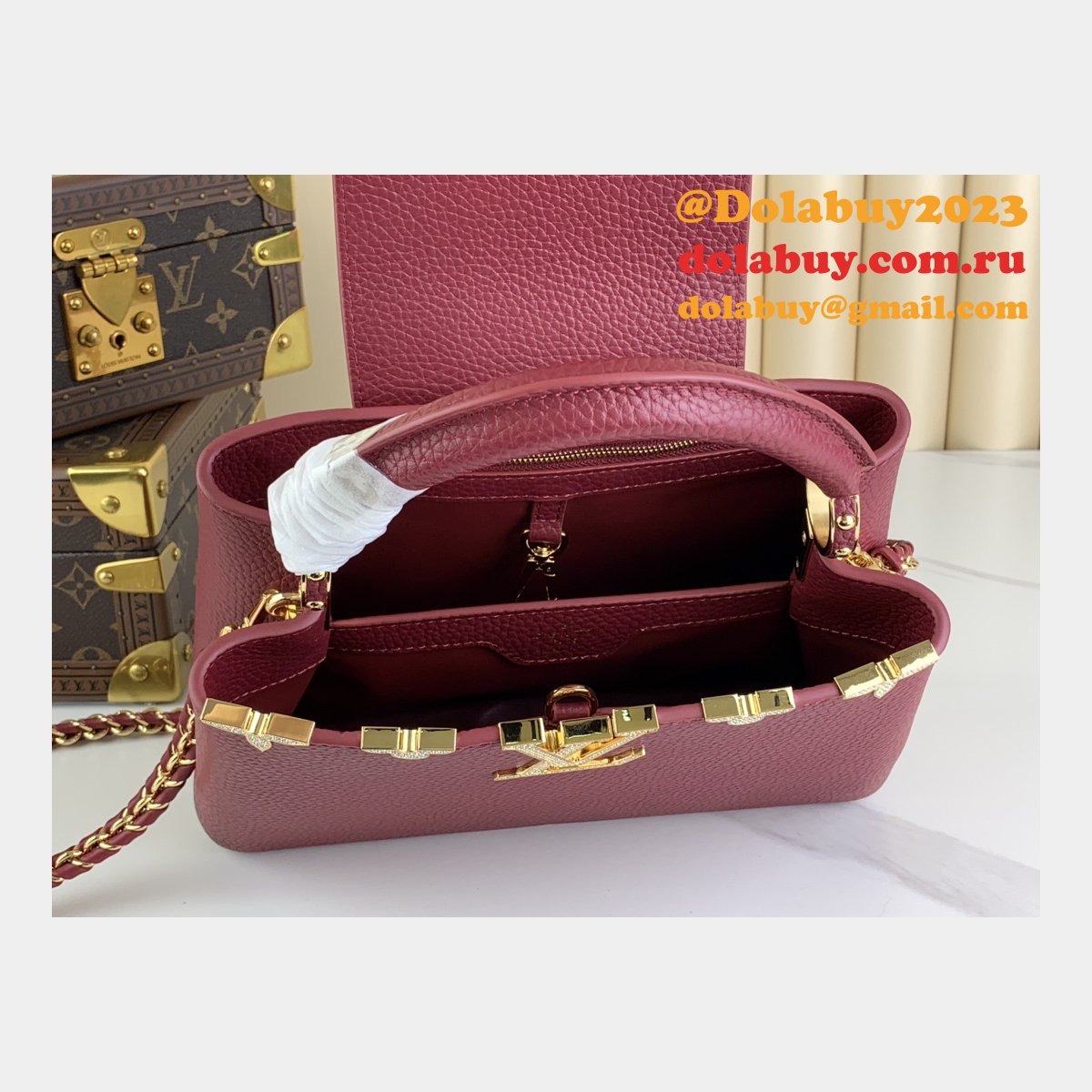 The Dolabuy Replica Capucines Louis Vuitton M48865 M24583 Bag