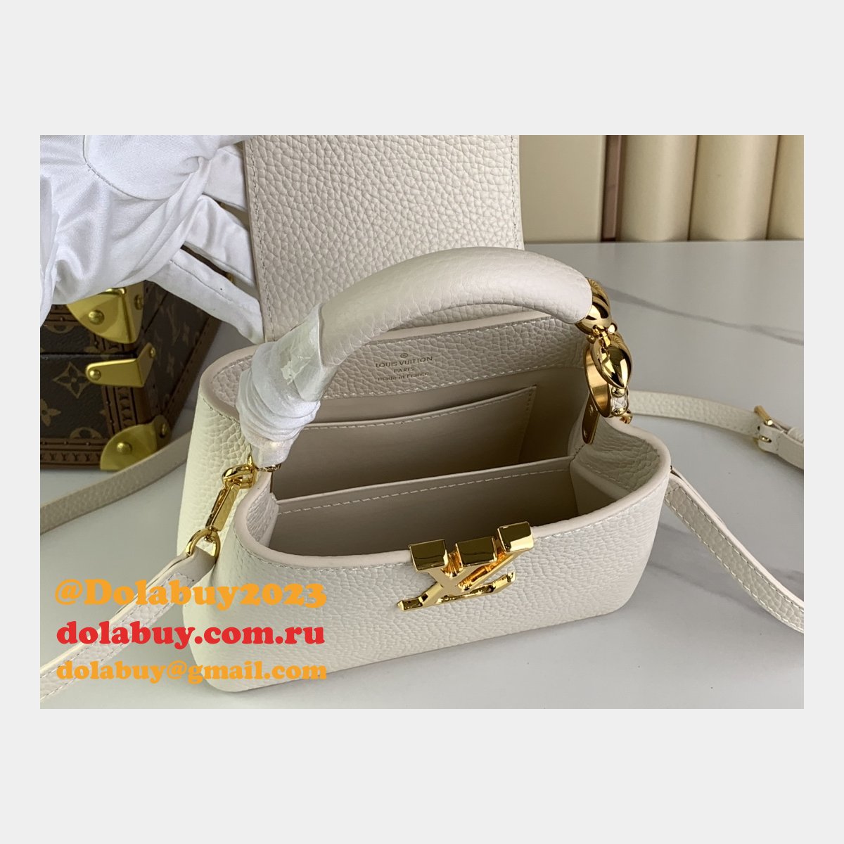 The Capucines M48865 M24989 M24698 Louis Vuitton Designer Replica Bag