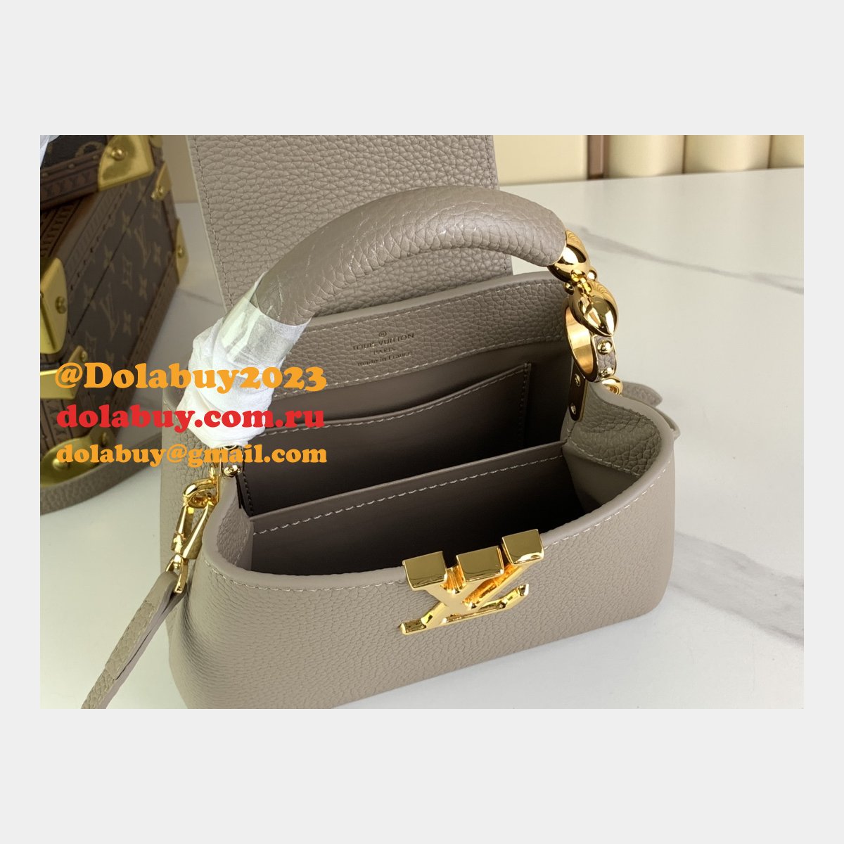 The Capucines M48865 M24989 M24698 Louis Vuitton Designer Replica Bag