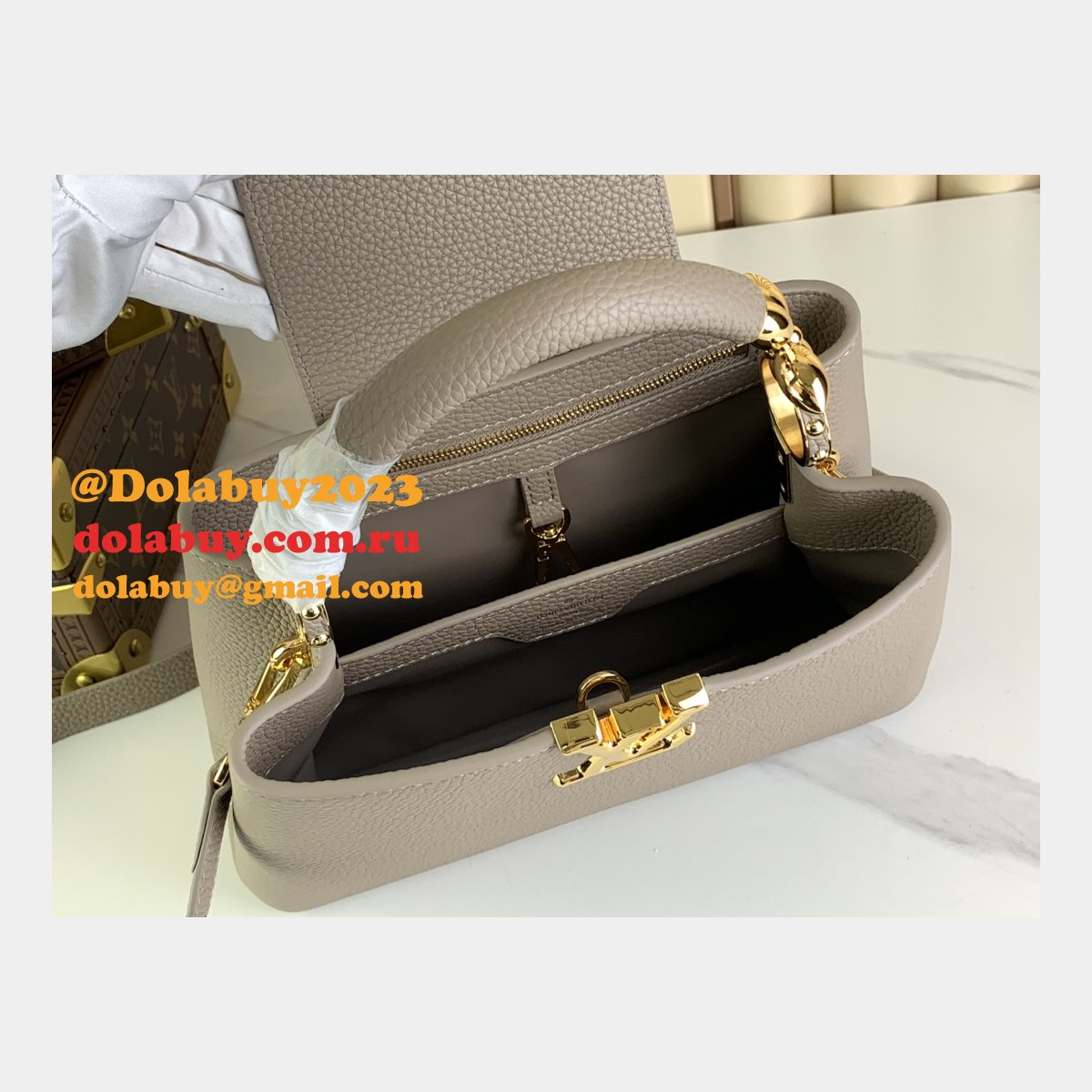 The Capucines M48865 M24989 M24698 Louis Vuitton Designer Replica Bag