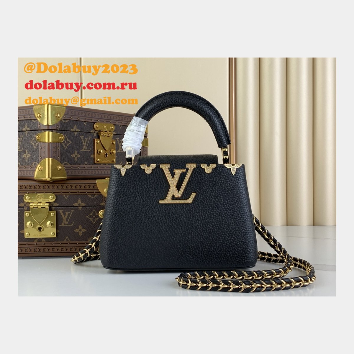 The Dolabuy Replica Capucines Louis Vuitton M48865 M24583 Bag
