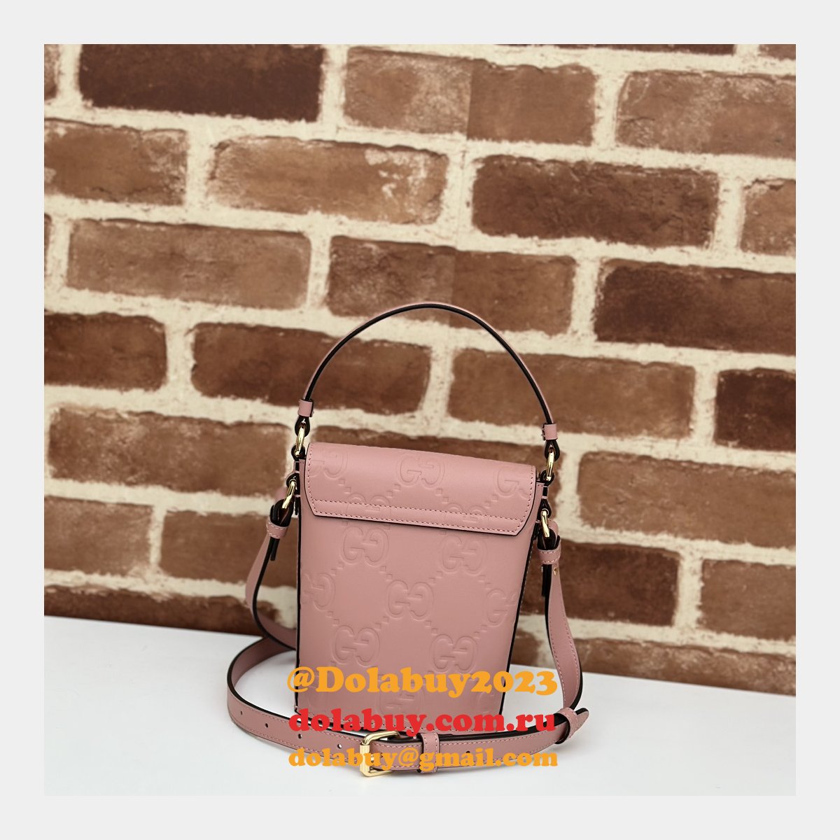 G*u*i 772795 uk embossed top handle replicas shoulder bag