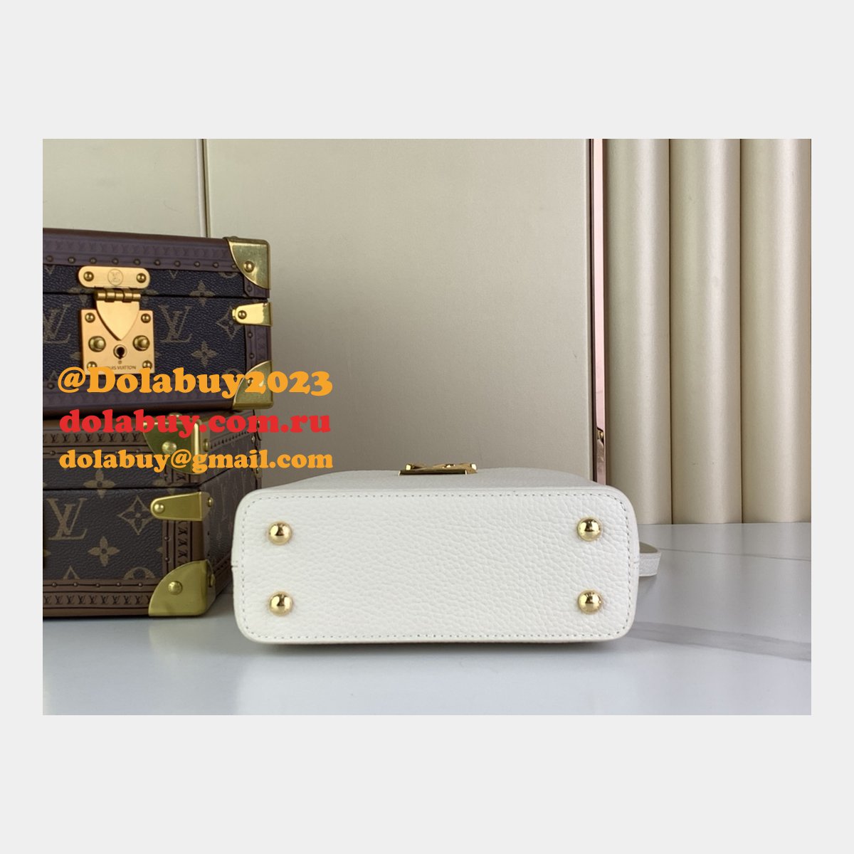 The Capucines M48865 M24989 M24698 Louis Vuitton Designer Replica Bag