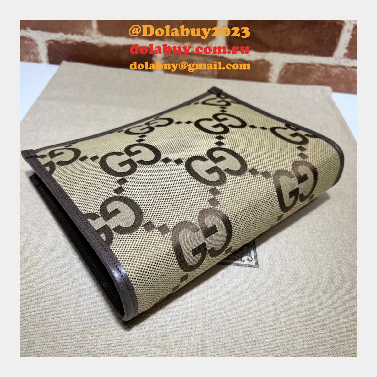 Gucci Replica 699318 Clutches Jumbo GG pouch camel ebony GG canvas