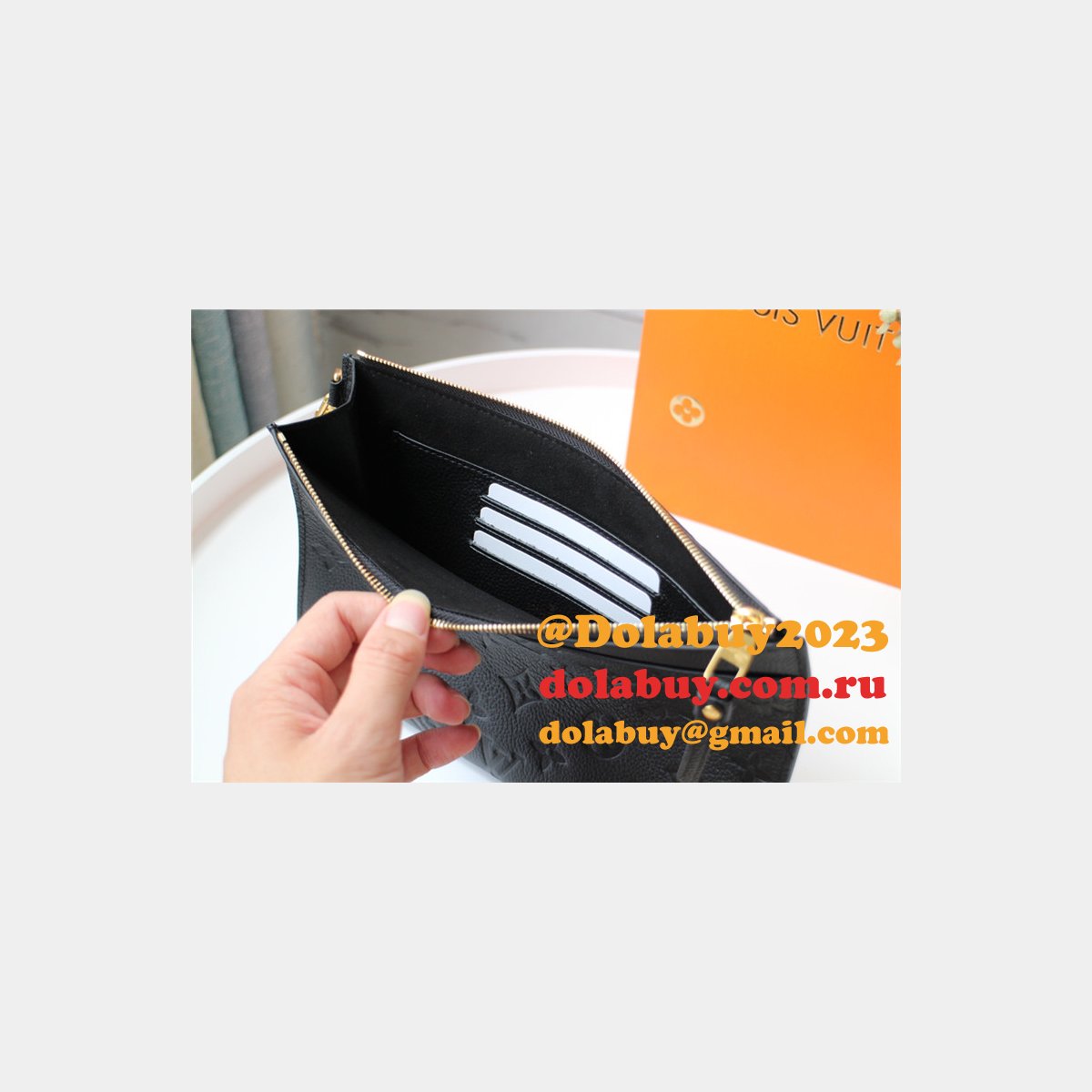 Louis Vuitton M68705 Replica Pochette Mélanie MM Monogram Empreinte Leather