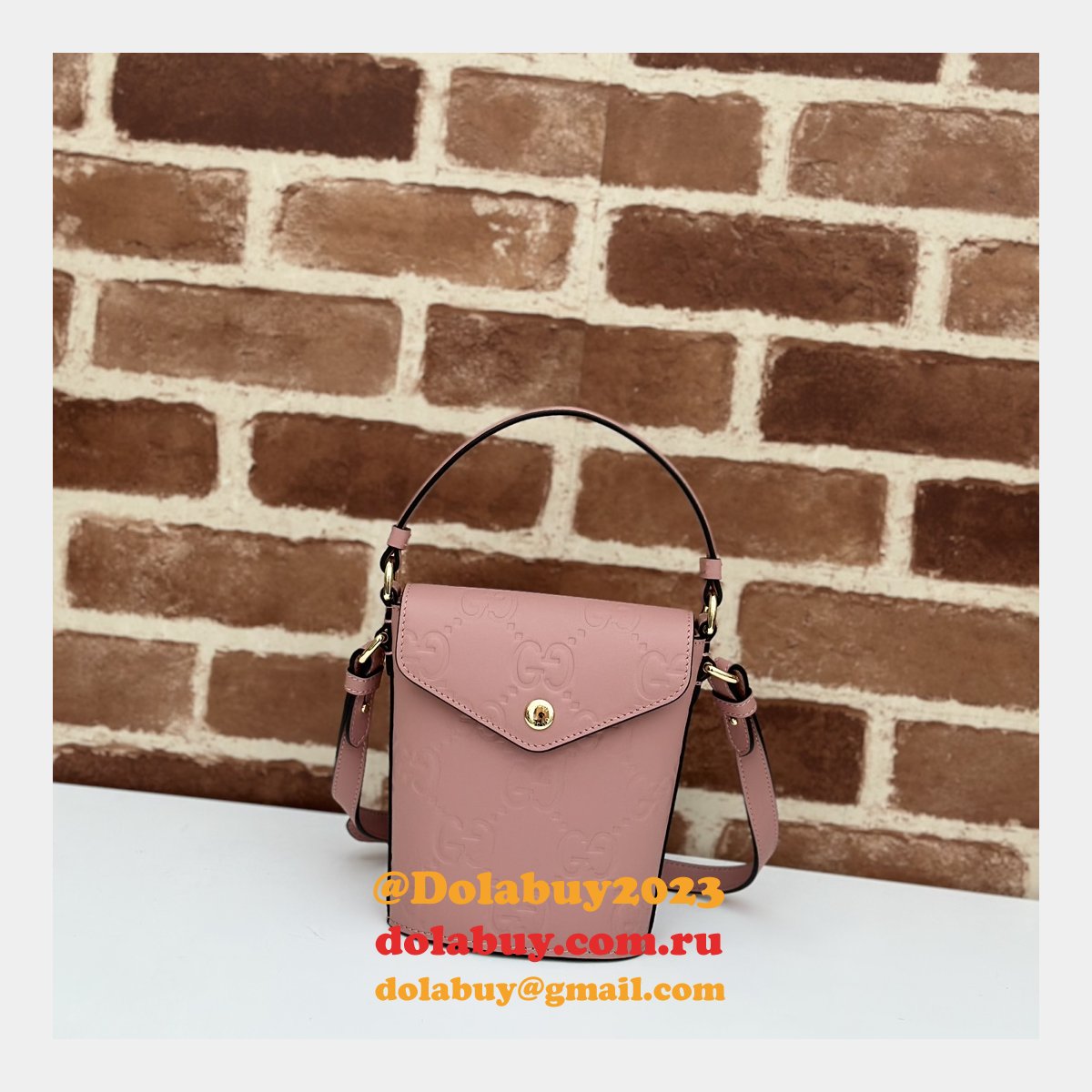 G*u*i 772795 uk embossed top handle replicas shoulder bag