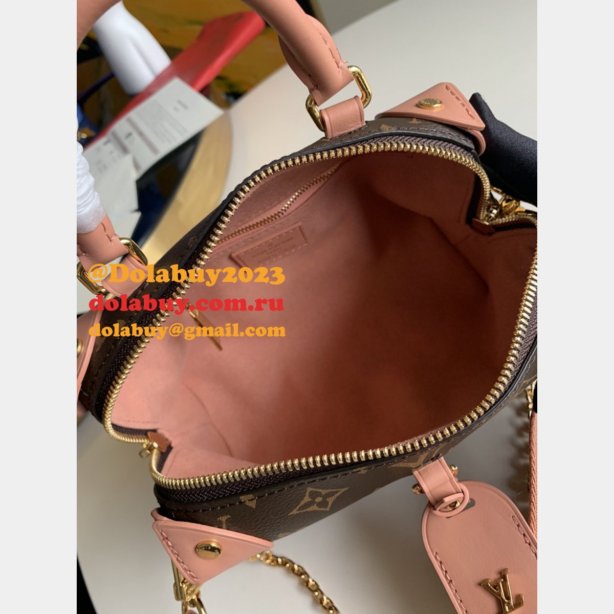 Replica Louis Vuitton Peach Petite Malle Souple Monogram