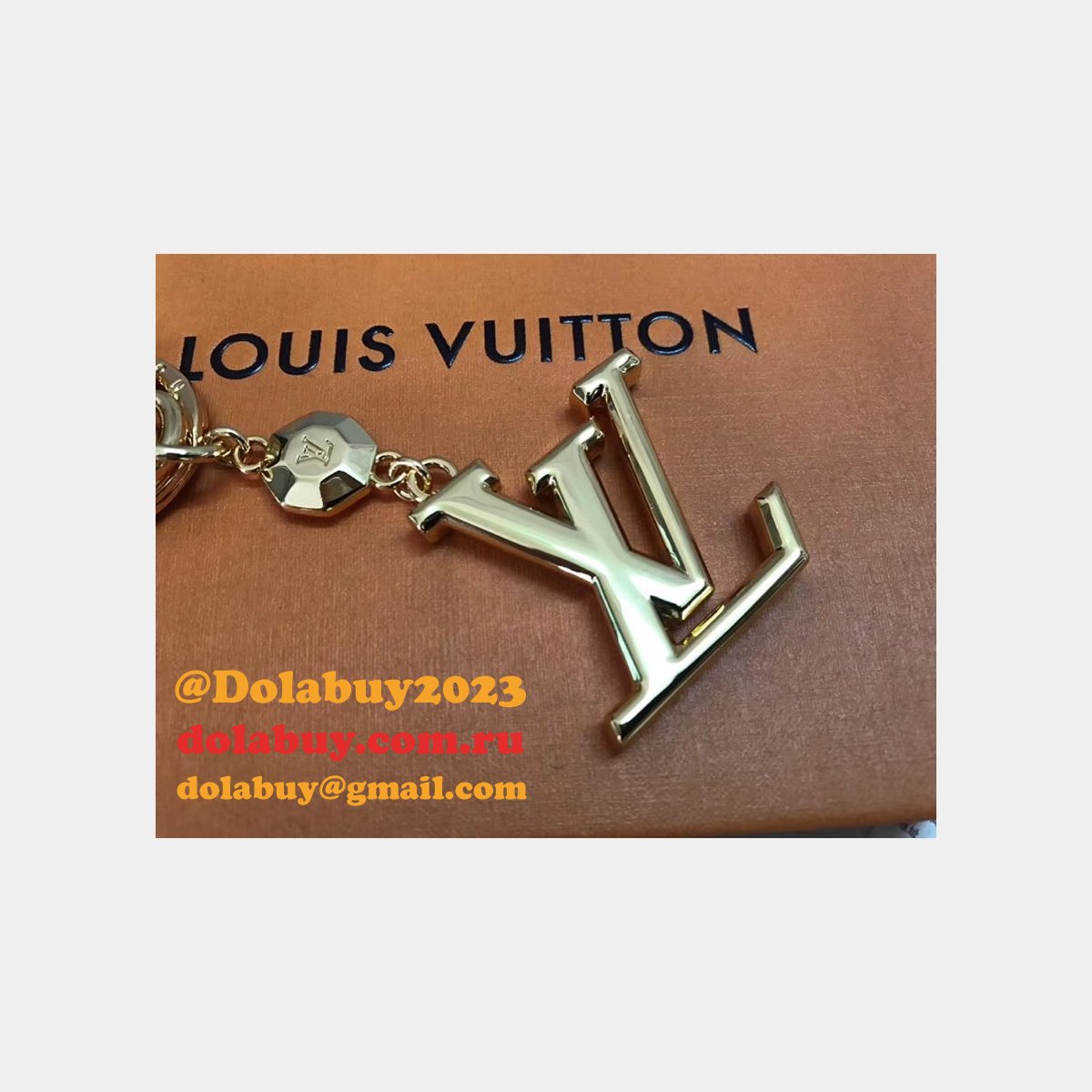 Fake LV Wholesale Facettes Bags Charm & Key Holder M65216 Gold