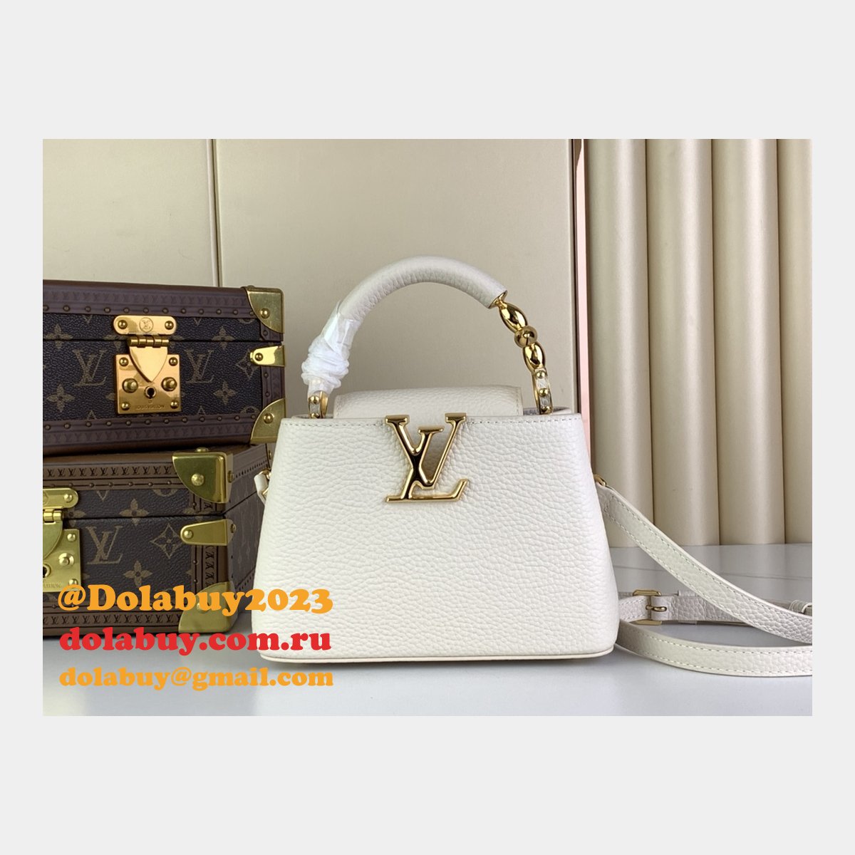 The Capucines M48865 M24989 M24698 Louis Vuitton Designer Replica Bag